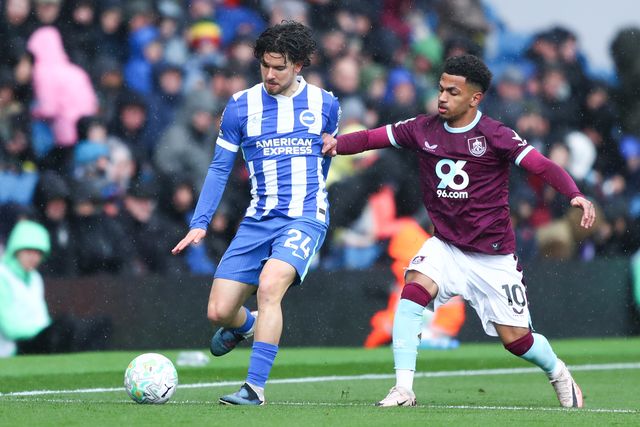Ferdi Kadıoglu of Brighton & Hove Albion under pressure from Marcus Edwards of Burnley during the Premier League match Burnley vs Brighton & Hove Albion at Turf Moor, Burnley, United Kingdom on 11 April 2026

(Photo by Jorge Horsted/News Images)