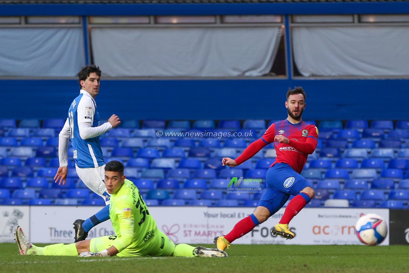 Adam Armstrong #7 of Blackburn Rovers scores a goal to make it 1-0