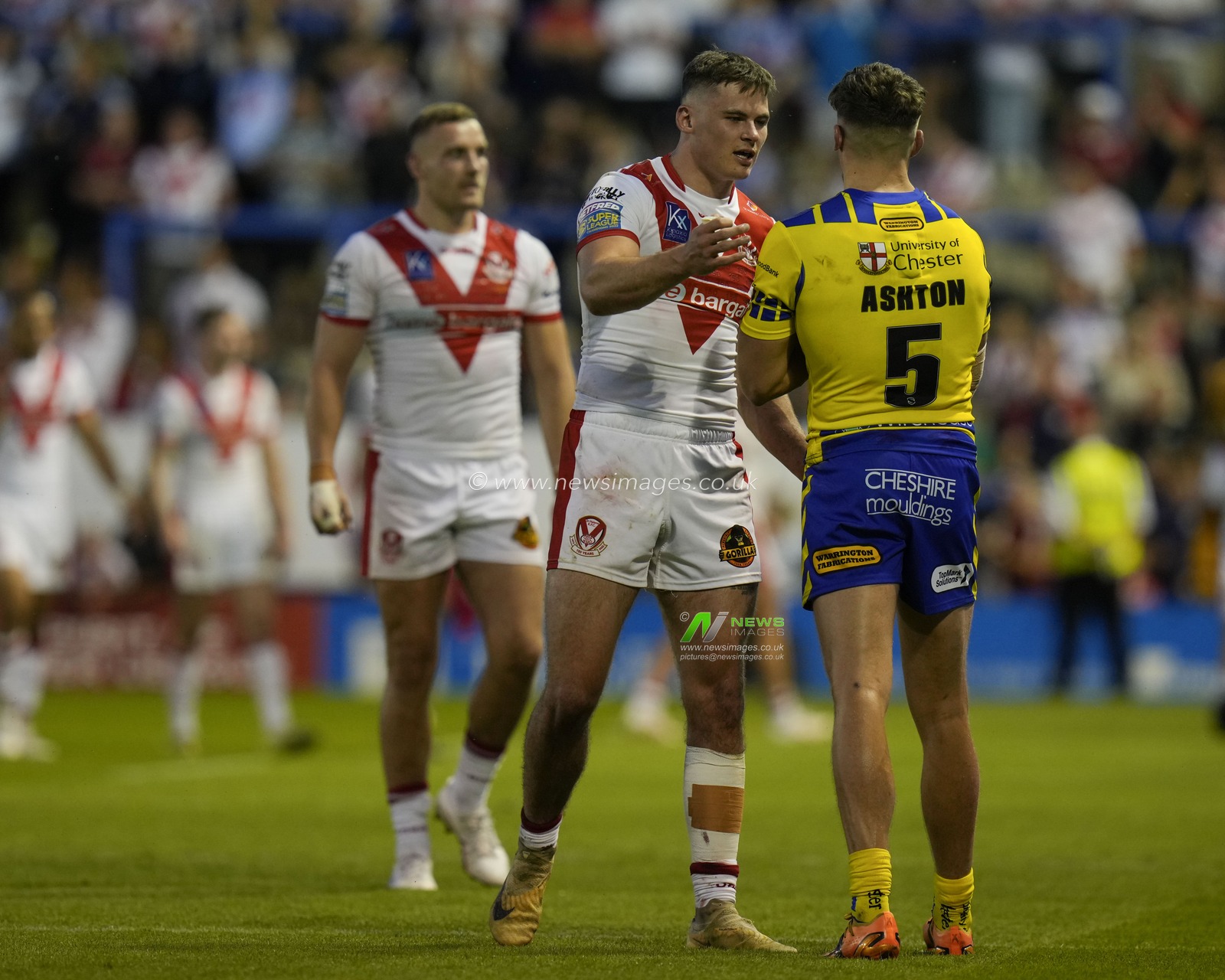 Jack Welsby #1 of St. Helens commiserates with Matty Ashton #5 of Warrington Wolves after the Betfred Super League Round 18 match Warrington Wolves vs St Helens at Halliwell Jones Stadium, Warrington, United Kingdom, 7th July 2023

(Photo by Steve Flynn/News Images)
