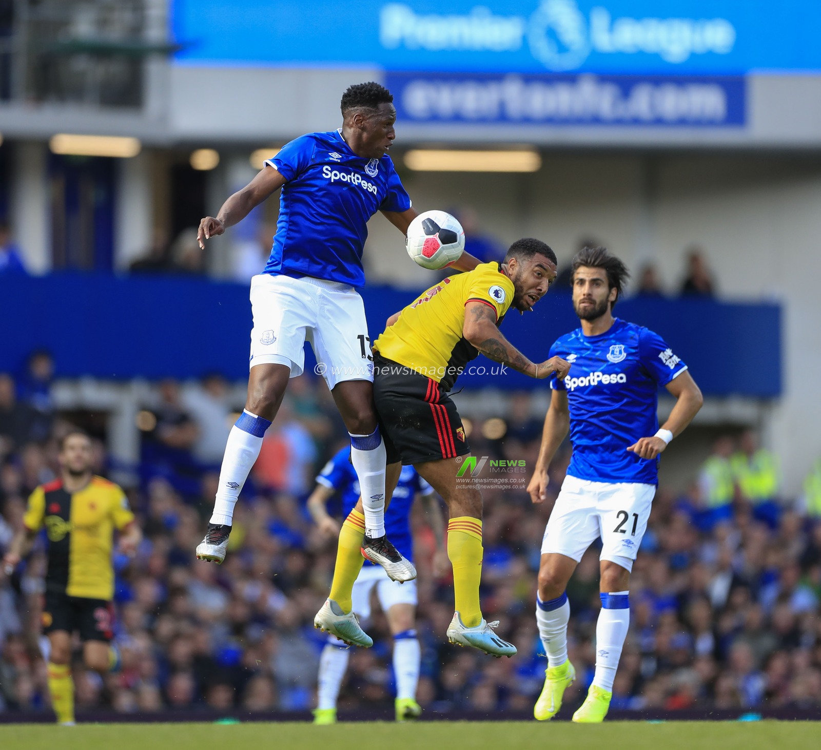 17th August 2019, Goodison Park, Liverpool, England ; Premier League Football, Everton vs Watford : Yerry Mina (13) of Everton and Troy Deeney (09) of Watford challenge for the header

Credit: Conor Molloy/News Images

English Football League images are subject to DataCo Licence