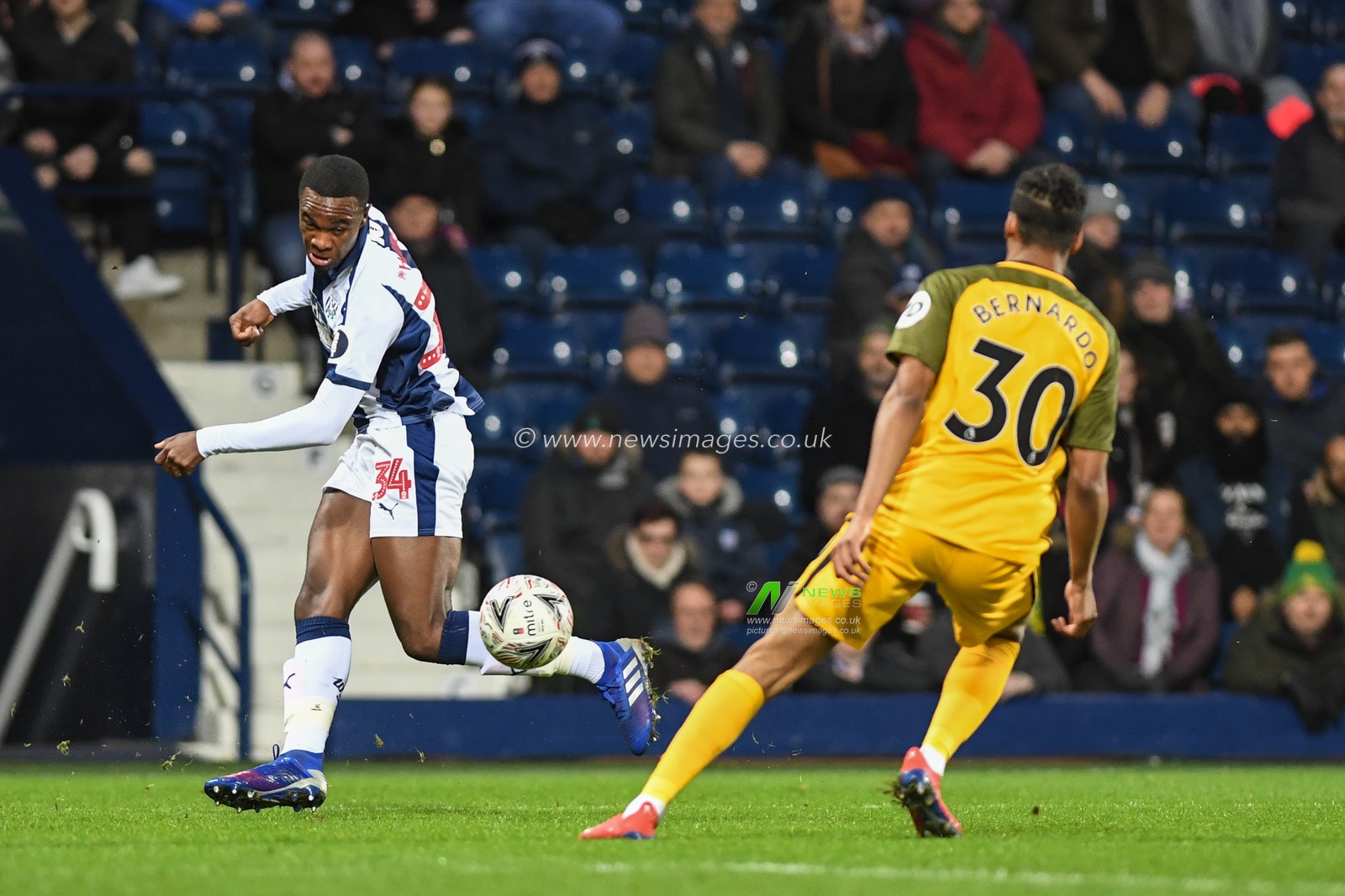 6th February 2019, The Hawthorns, West Bromwich, England; Emirates FA Cup, 4th Round replay, West Bromwich Albion vs Brighton ; Rekeem Harper (34) of West Brom closed down by Bernardo (30) of brighton

Credit: Phil Westlake/News Images,

English Football League images are subject to DataCo Licence