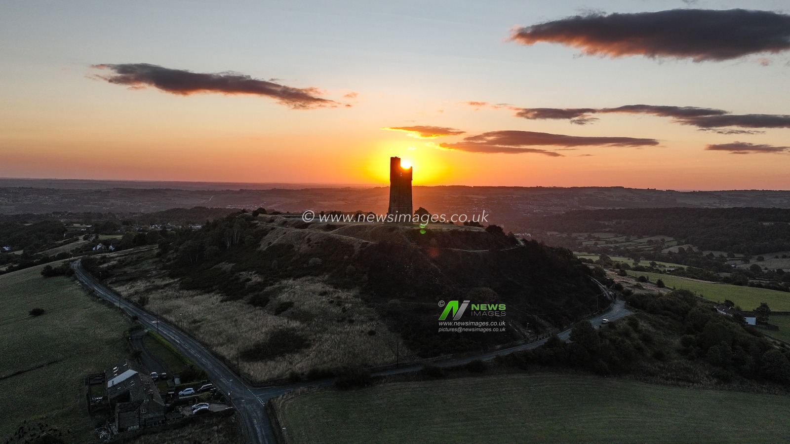 The Sun rises over Victoria Tower, Castle Hill, Huddersfield, United Kingdom, 9th August 2025

(Photo by Alfie Cosgrove/News Images)