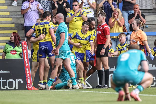 Jake Thewlis of Warrington Wolves celebrates his try during the Betfred Super League round 15 match Warrington Wolves vs Huddersfield Giants at Halliwell Jones Stadium, Warrington, United Kingdom, 21st June 2025

(Photo by Alfie Cosgrove/News Images)
