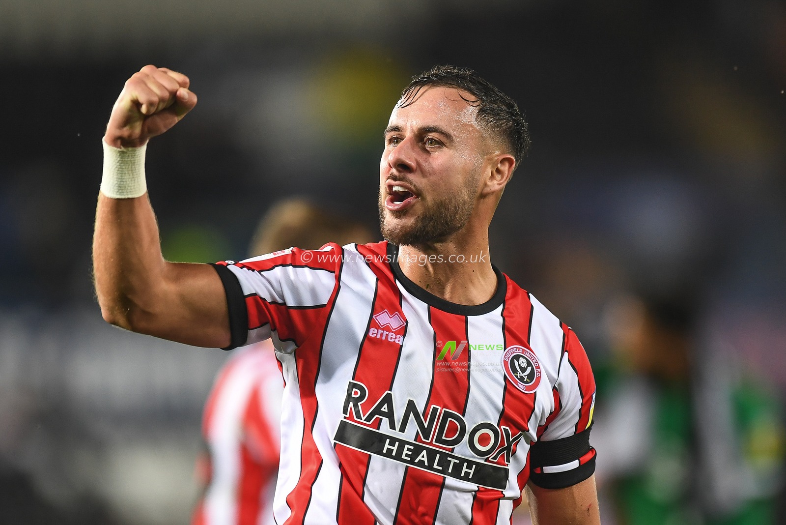 George Baldock #2 of Sheffield United Applauds the travelling supportersduring the Sky Bet Championship match Swansea City vs Sheffield United at Swansea.com Stadium, Swansea, United Kingdom, 13th September 2022

(Photo by Mike Jones/News Images)