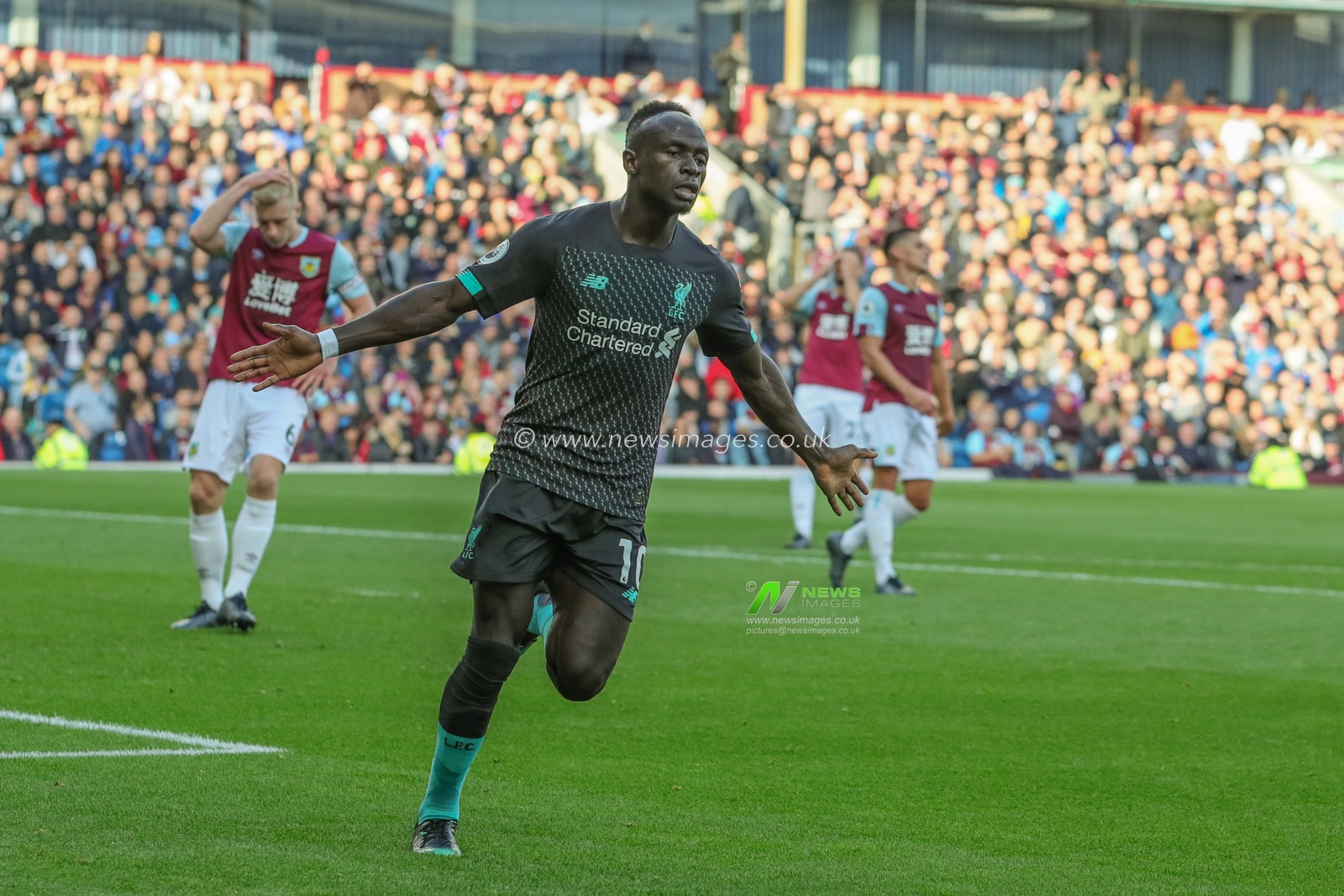 31st August 2019, Turf Moor, Burnley, England ; Premier League Football, Burnley vs Liverpool : Sadio Mane (10) of Liverpool celebrates his goal to make it 0-2

Credit: Mark Cosgrove/News Images

English Football League images are subject to DataCo Licence