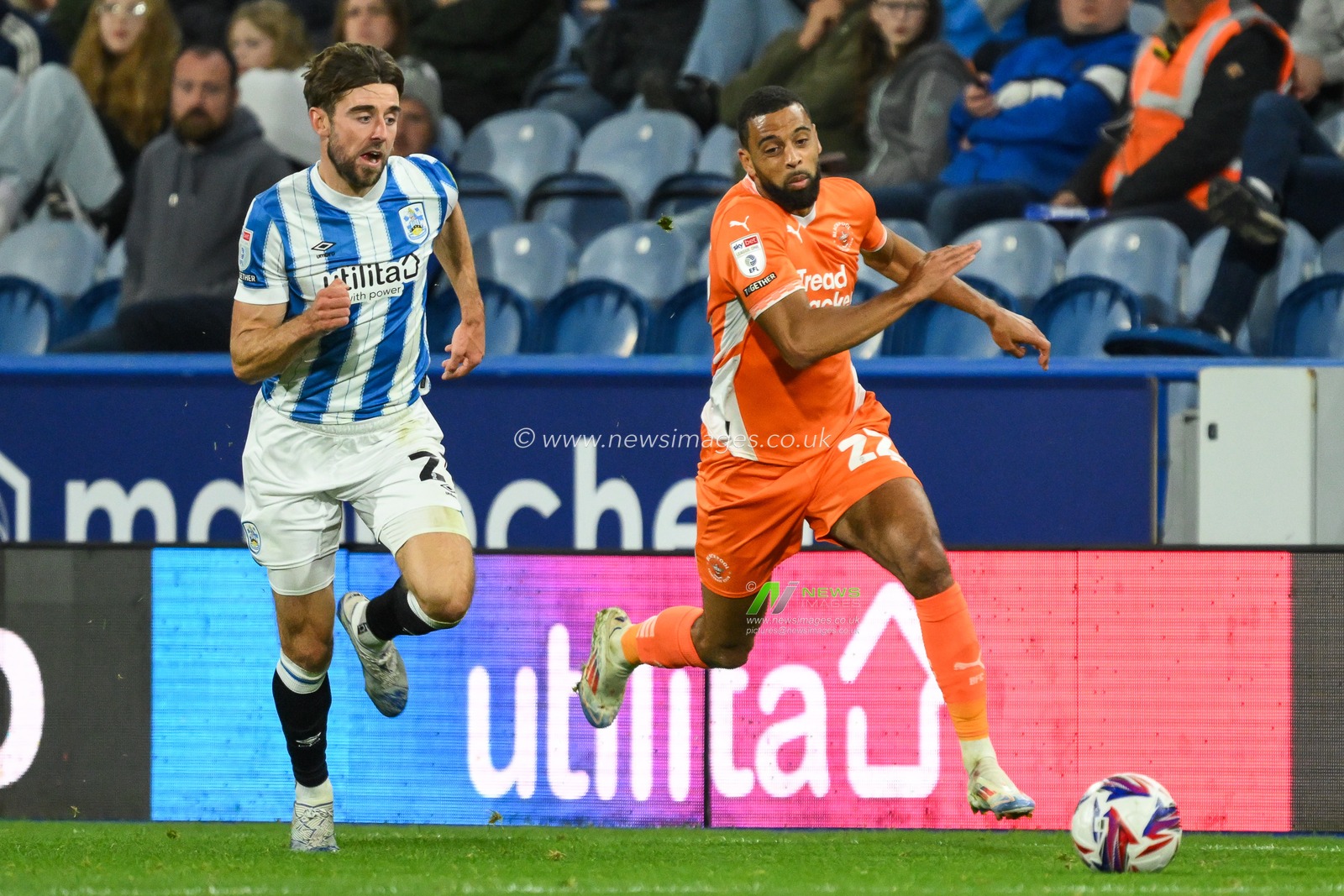 CJ Hamilton of Blackpool makes a break with the ball  during the Sky Bet League 1 match Huddersfield Town vs Blackpool at John Smith's Stadium, Huddersfield, United Kingdom, 24th September 2024

(Photo by Craig Thomas/News Images)