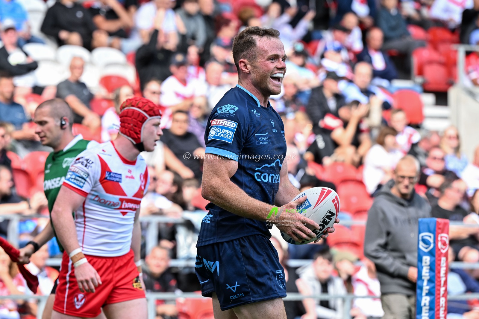 Joe Burgess of Hull KR celebrates his try to make it 0-20 Hull during the Betfred Super League Round 23 match St Helens vs Hull KR at Totally Wicked Stadium, St Helens, United Kingdom, 24th August 2024

(Photo by Cody Froggatt/News Images)