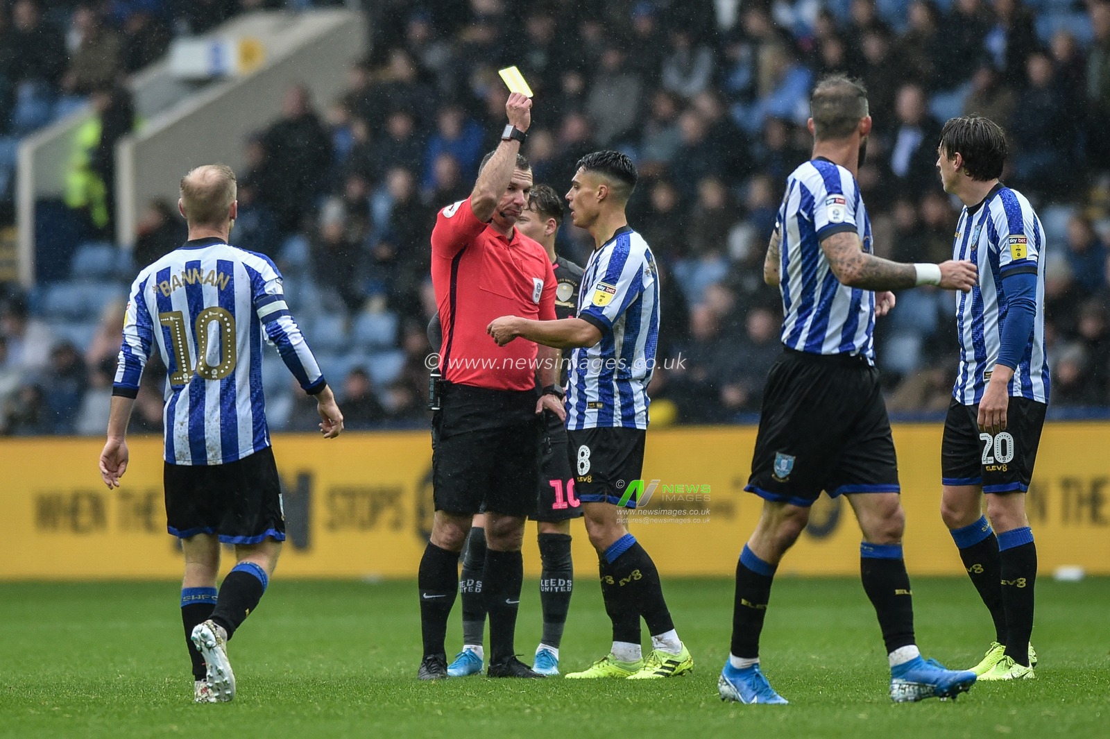 26th October 2019, Hillsborough, Sheffield, England; Sky Bet Championship, Sheffield Wednesday v Leeds United : Joey Pelupessy (8) of Sheffield Wednesday  receives a yellow card. 
Credit: Dean Williams/News Images
