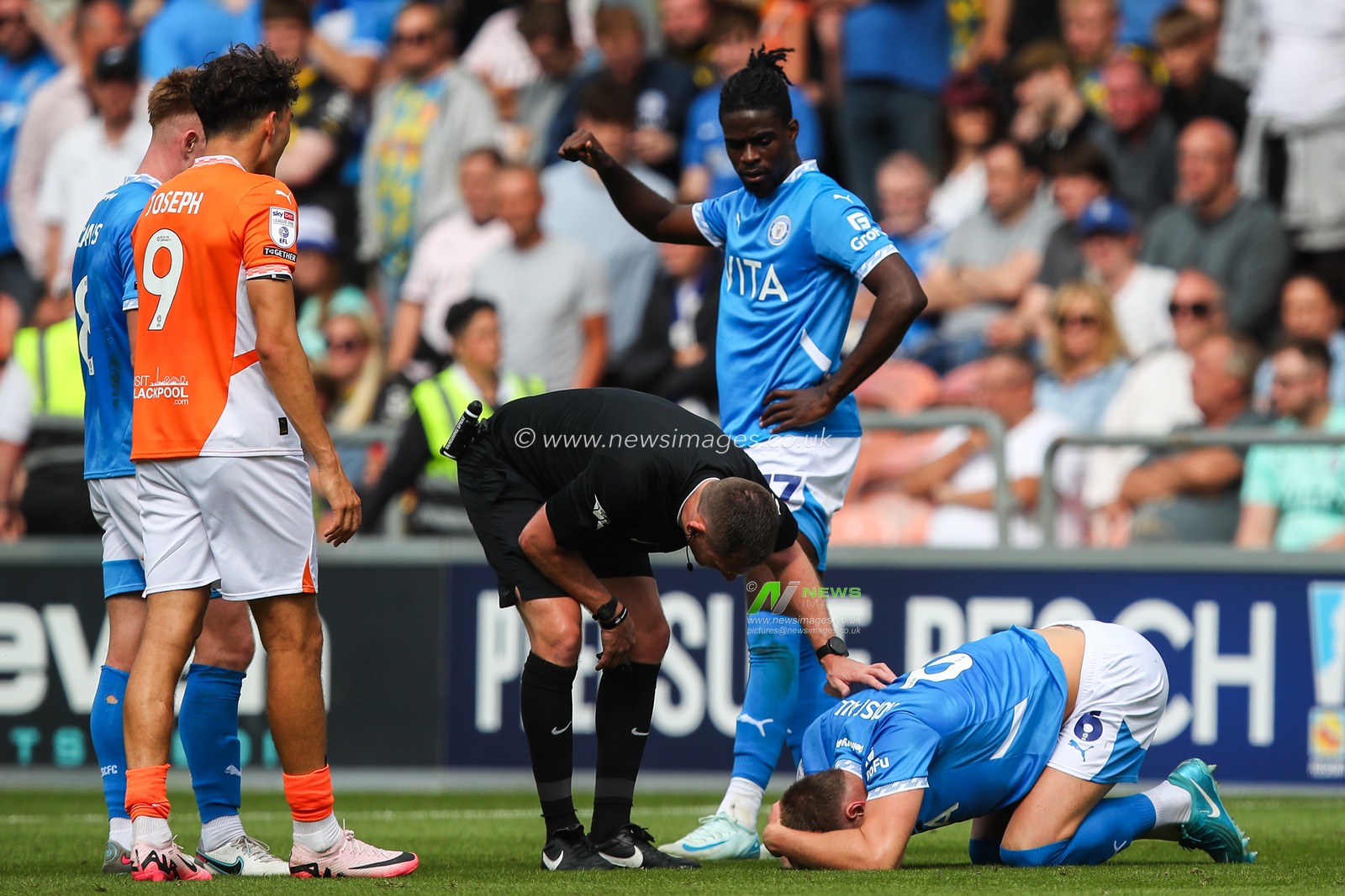 Referee Simon Mather checks on Fraser Horsfall of Stockport County during the Sky Bet League 1 match Blackpool vs Stockport County at Bloomfield Road, Blackpool, United Kingdom, 17th August 2024

(Photo by Gareth Evans/News Images)
