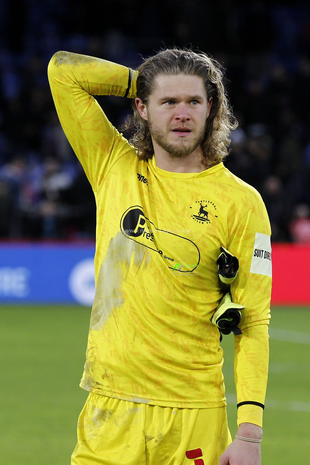 Bryn Morris # of Hartlepool United is dejected after defeat
