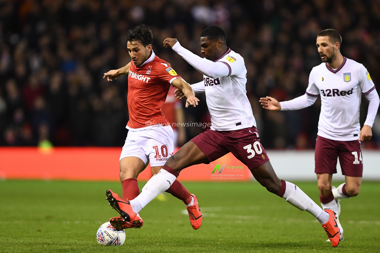 13th March 2019, City Ground, Nottingham, England ; Sky Bet Championship, Nottingham Forest v Aston Villa : Kortney Hause (30) of Aston Villa tackles Joao Carvalho (10) of Nottingham Forest 

Credit: Jon Hobley/News Images

English Football League images are subject to DataCo Licence