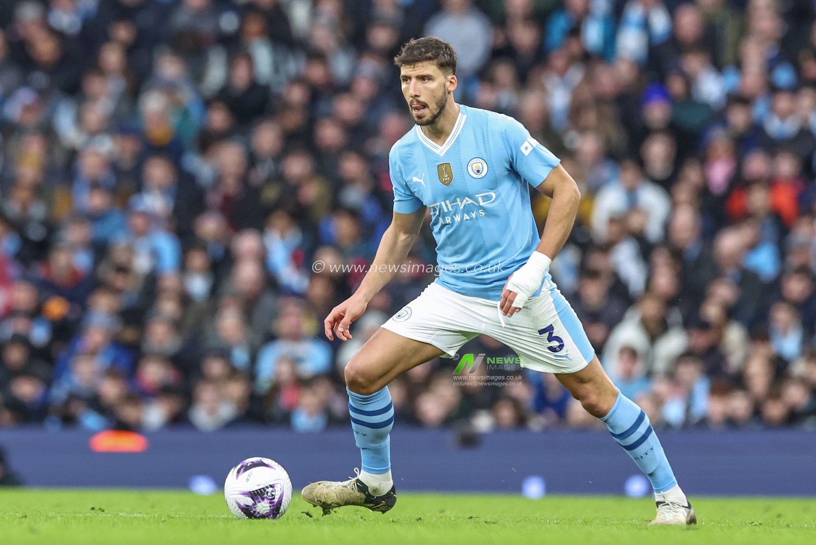 RÃºben Dias of Manchester City in action during the Premier League match Manchester City vs Manchester United at Etihad Stadium, Manchester, United Kingdom, 3rd March 2024

(Photo by Mark Cosgrove/News Images)
