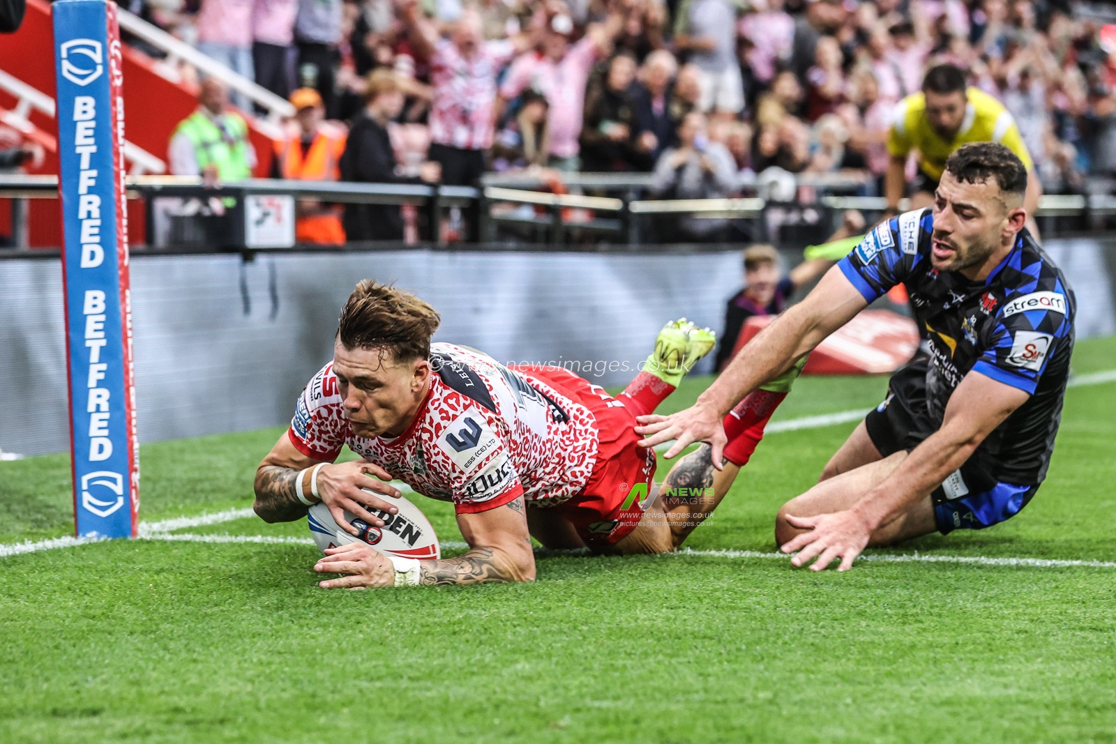 Keanan Brand of Leigh Leopards goes over for a try during the Betfred Super League round 21 match Leigh Leopards vs Leeds Rhinos at Leigh Sports Village, Leigh, United Kingdom, 7th August 2025

(Photo by Alfie Cosgrove/News Images)