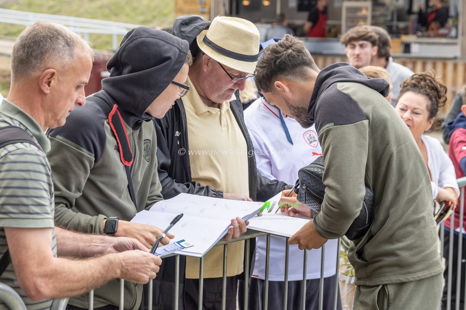 Corey O'Keeffe #22 of Barnsley signs a fans book during the Sky Bet League 1 match Northampton Town vs Barnsley at Sixfields Stadium, Northampton, United Kingdom, 23rd September 2023

(Photo by Mark Cosgrove/News Images)