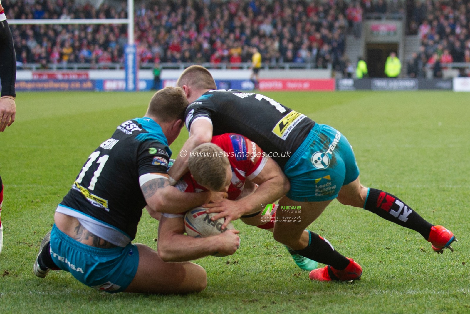17th February 2019 ,  AJ Bell Stadium, Salford, England;  Betfred Super League, Round 10, Salford Red Devils vs Leeds Rhinos ; Joey Lussick (14) of Salford Red Devils scores a try 

Credit: Richard Long/News Images