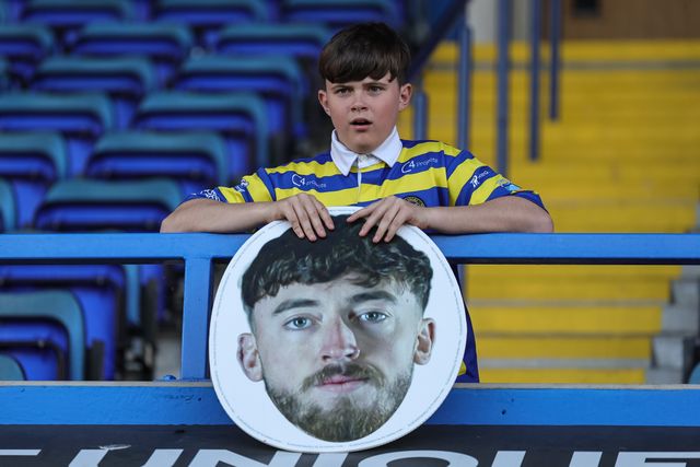 A young Wire fan with a Matty Ashton of Warrington Wolves head banner during the Betfred Super League round 9 match Warrington Wolves vs Wigan Warriors at The Halliwell Jones Stadium, Warrington, United Kingdom on 24 April 2026

(Photo by Mark Cosgrove/News Images)