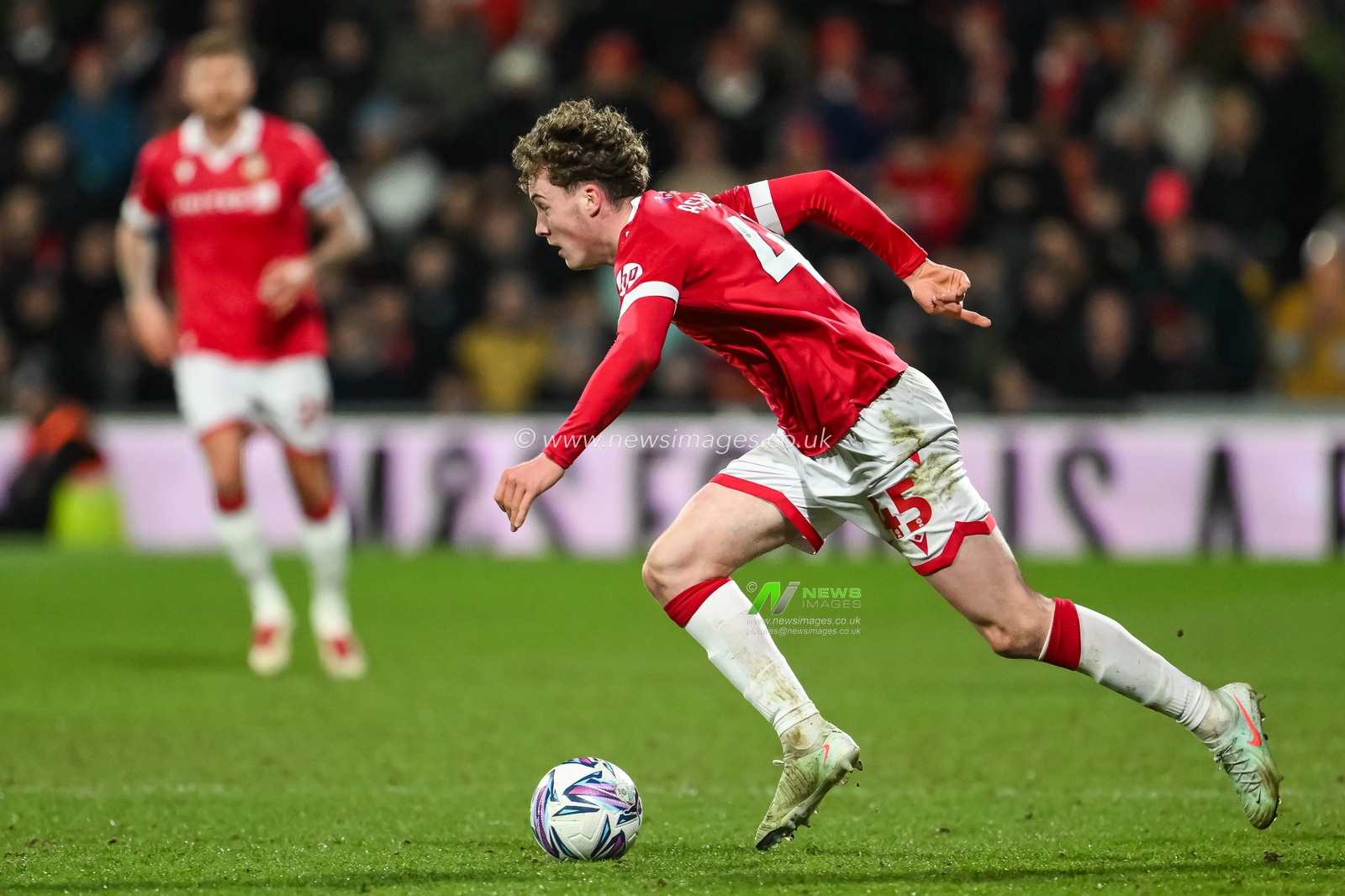 Harry Ashfield of Wrexham makes a break with the ball during the The Vertu Trophy Semi-finals Wrexham vs Peterborough United at SToK Cae Ras, Wrexham, United Kingdom, 26th February 2025

(Photo by Craig Thomas/News Images)