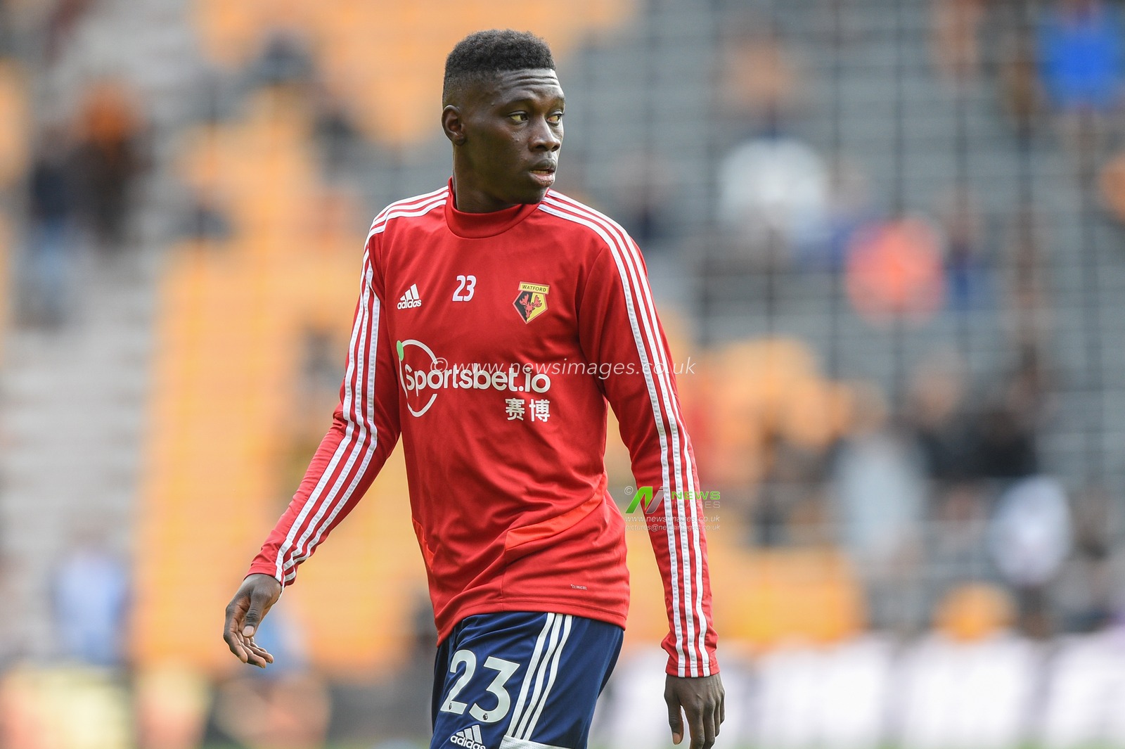 28th September 2019, Molineux, Wolverhampton, England; Premier League, Wolverhampton Wanderers v Watford : Ismaila Sarr (23) of Watford during the pre match warm up.

Credit: Richard Long/News Images