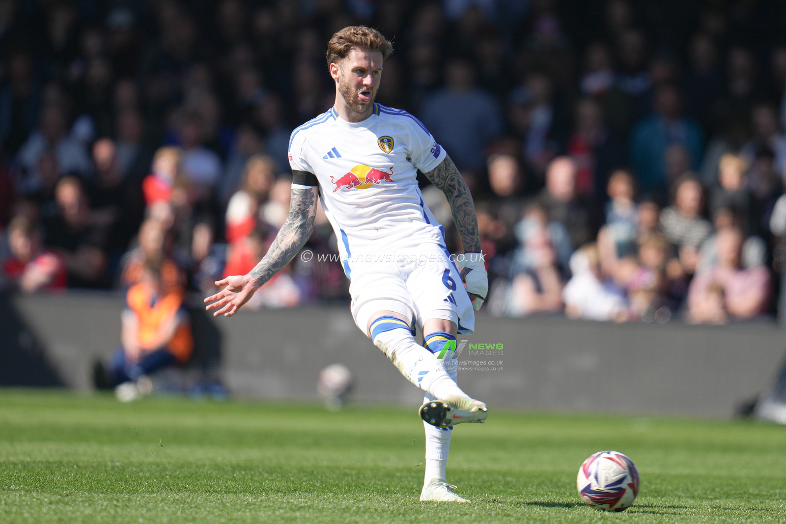 Joe Rodon of Leeds United plays the ball during the Sky Bet Championship match Luton Town vs Leeds United at Kenilworth Road, Luton, United Kingdom, 5th April 2025

(Photo by Harvey Murphy/News Images)