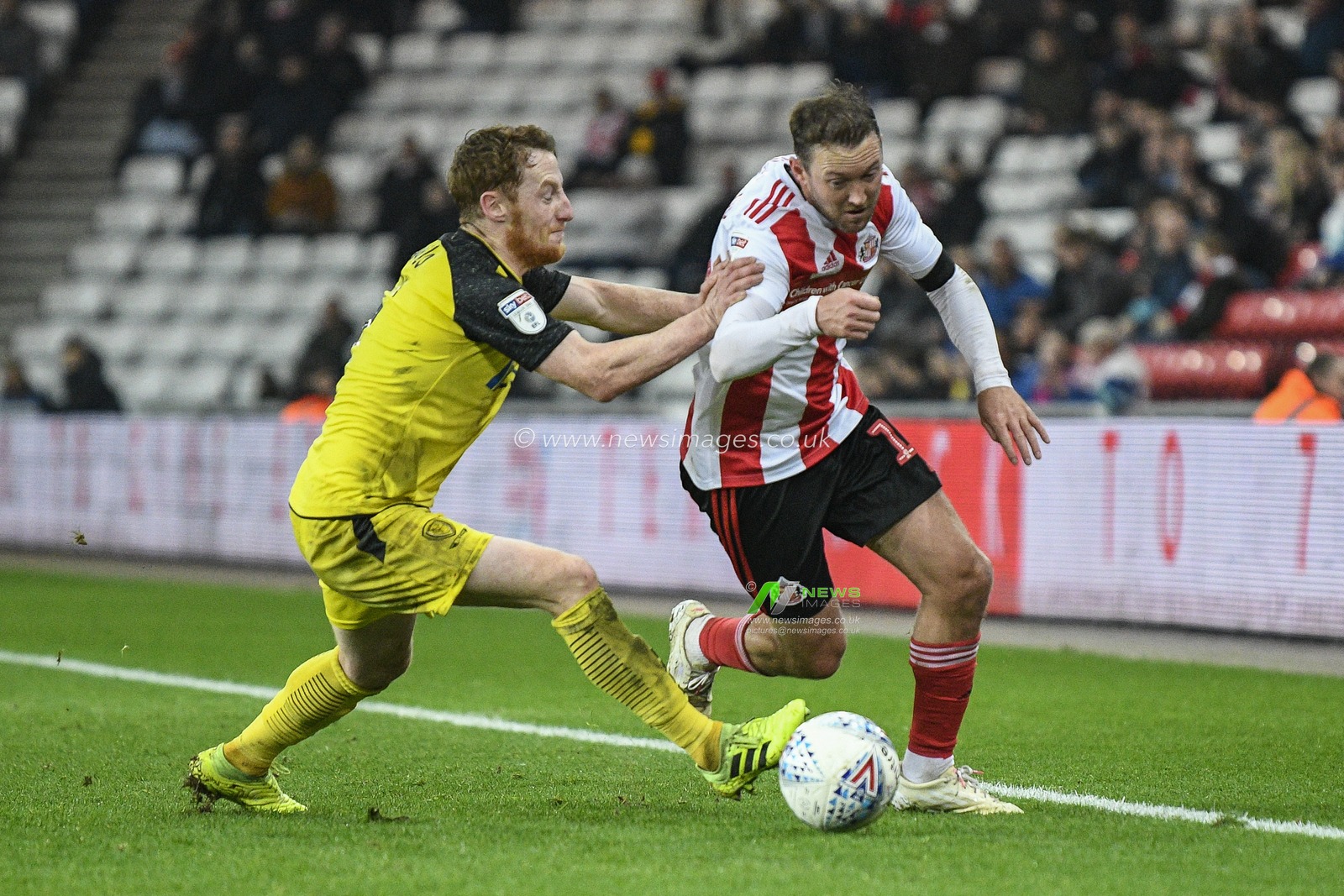 26th November 2019, Stadium Of Light, Sunderland, England; Sky Bet League 1, Sunderland v Burton Albion : Aidan McGeady (19) of Sunderland gets past Stephen Quinn (7) of Burton Albion

Credit: Iam Burn/News Images