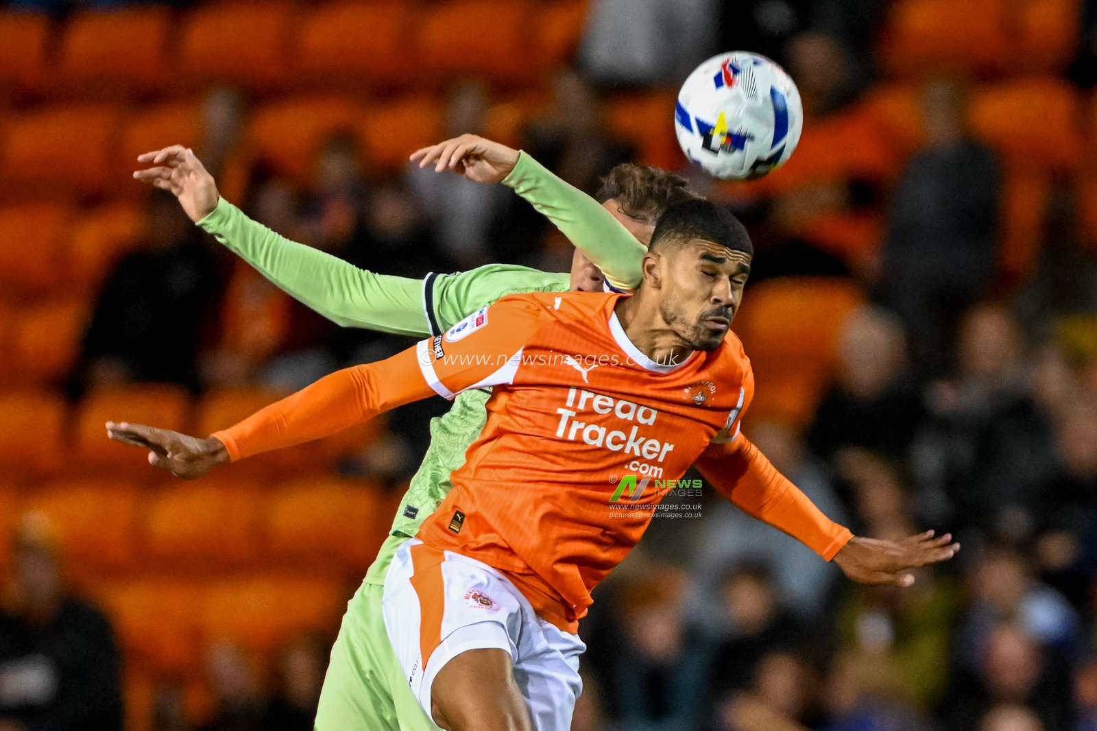 Ashley Fletcher of Blackpool  wins the ball in the air with a header from Kal Naismith of Luton Town during the Sky Bet League 1 match Blackpool vs Luton Town at Bloomfield Road, Blackpool, United Kingdom, 30th September 2025

(Photo by Adam Gee/News Images)