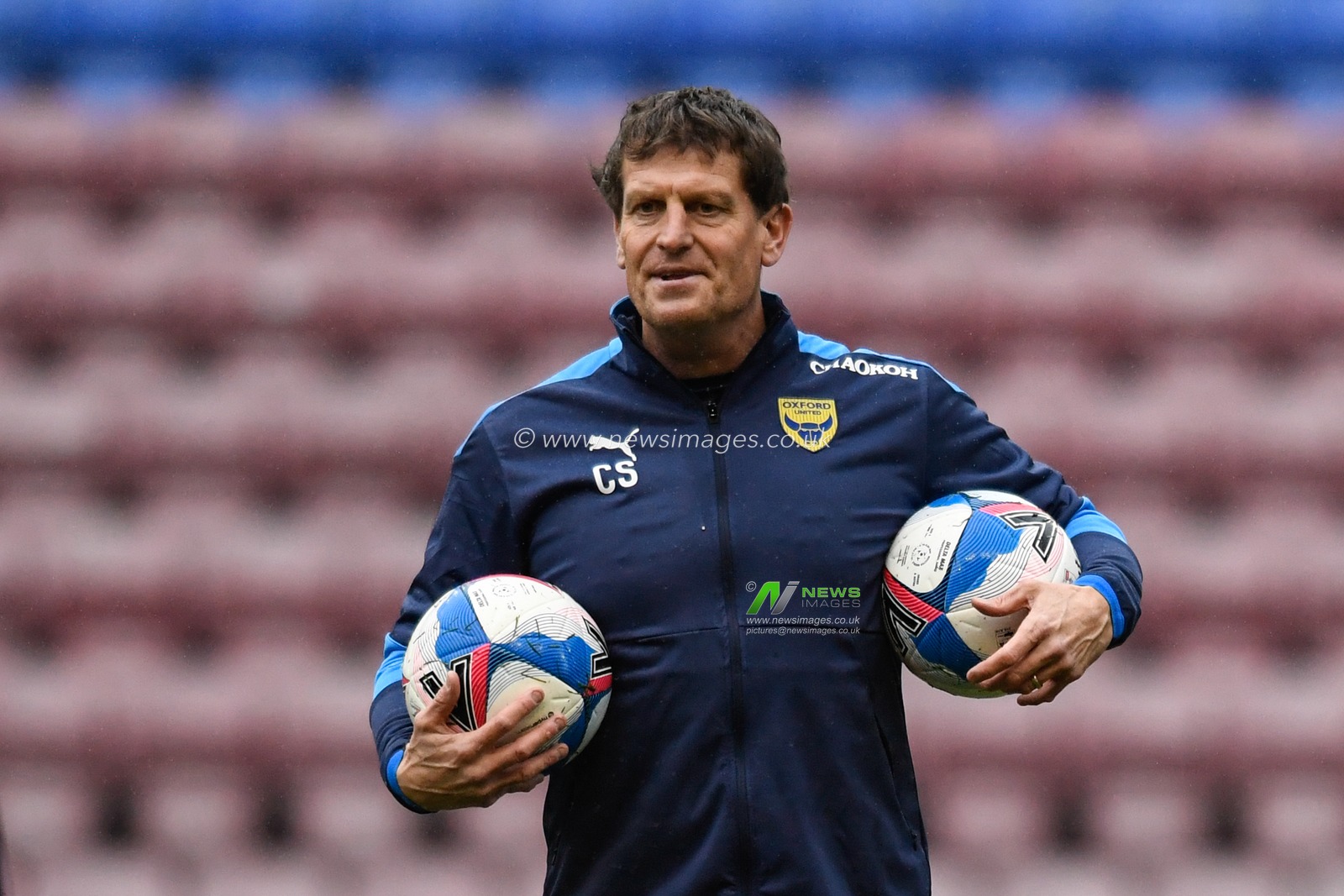 Craig Short of Oxford United leading the warm up