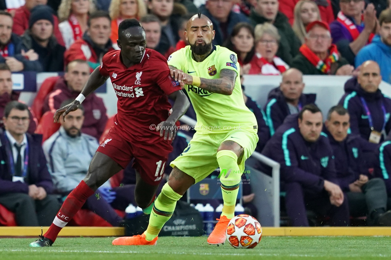 Barcelona's Arturo Vidal is tackled by Liverpool's Sadio Mane

7th Mayl 2019 , Anfield Stadium, Liverpool, England;  UEFA Champions League Semi Final, Second Leg, Liverpool FC vs FC Barcelona 

Credit: Terry Donnelly/News Images