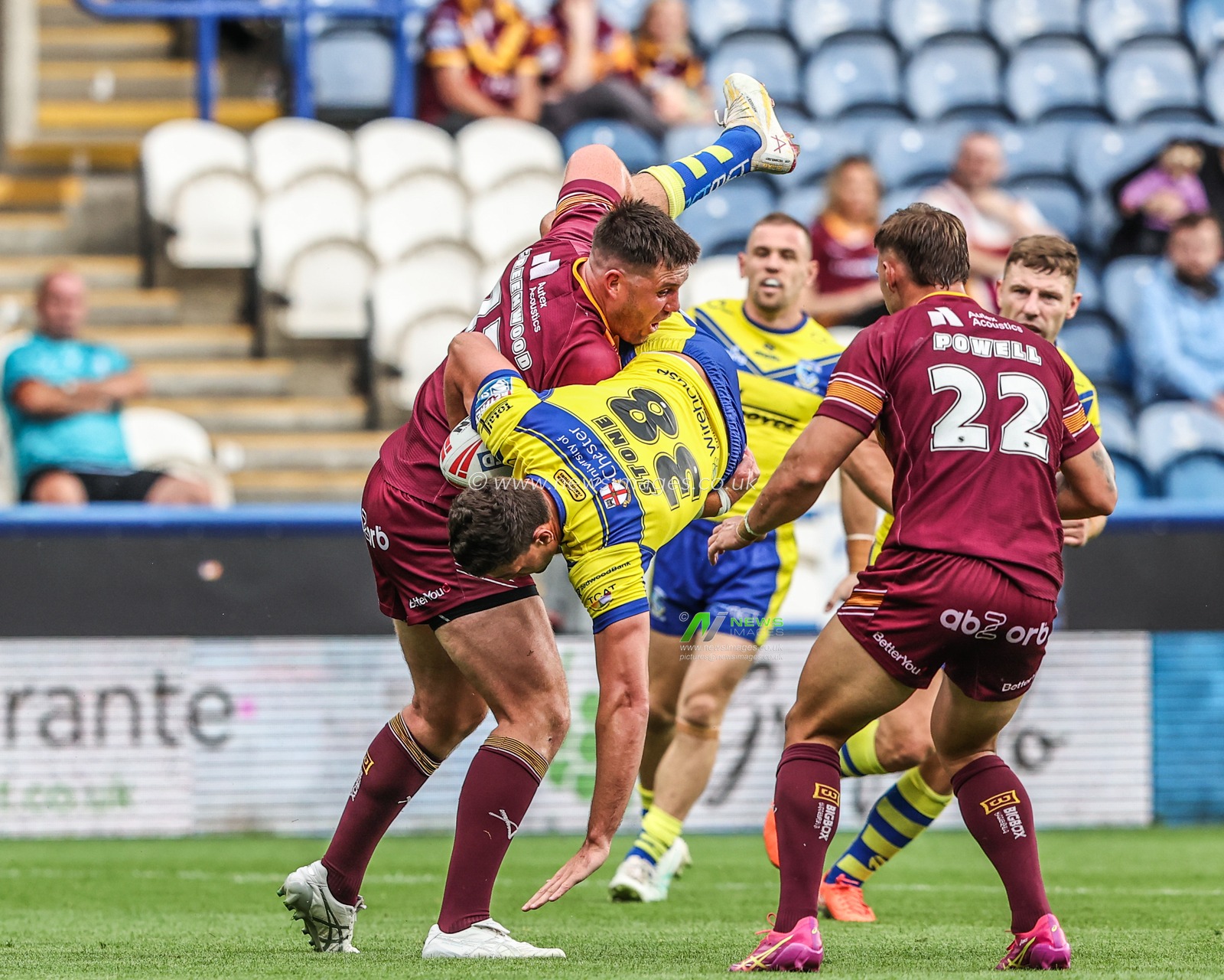 Sam Stone of Warrington Wolves is tackled by Joe Greenwood of Huddersfield Giants during the Betfred Super League Round 23 match Huddersfield Giants vs Warrington Wolves at Accu Stadium, Huddersfield, United Kingdom, 24th August 2025

(Photo by Alfie Cosgrove/News Images)