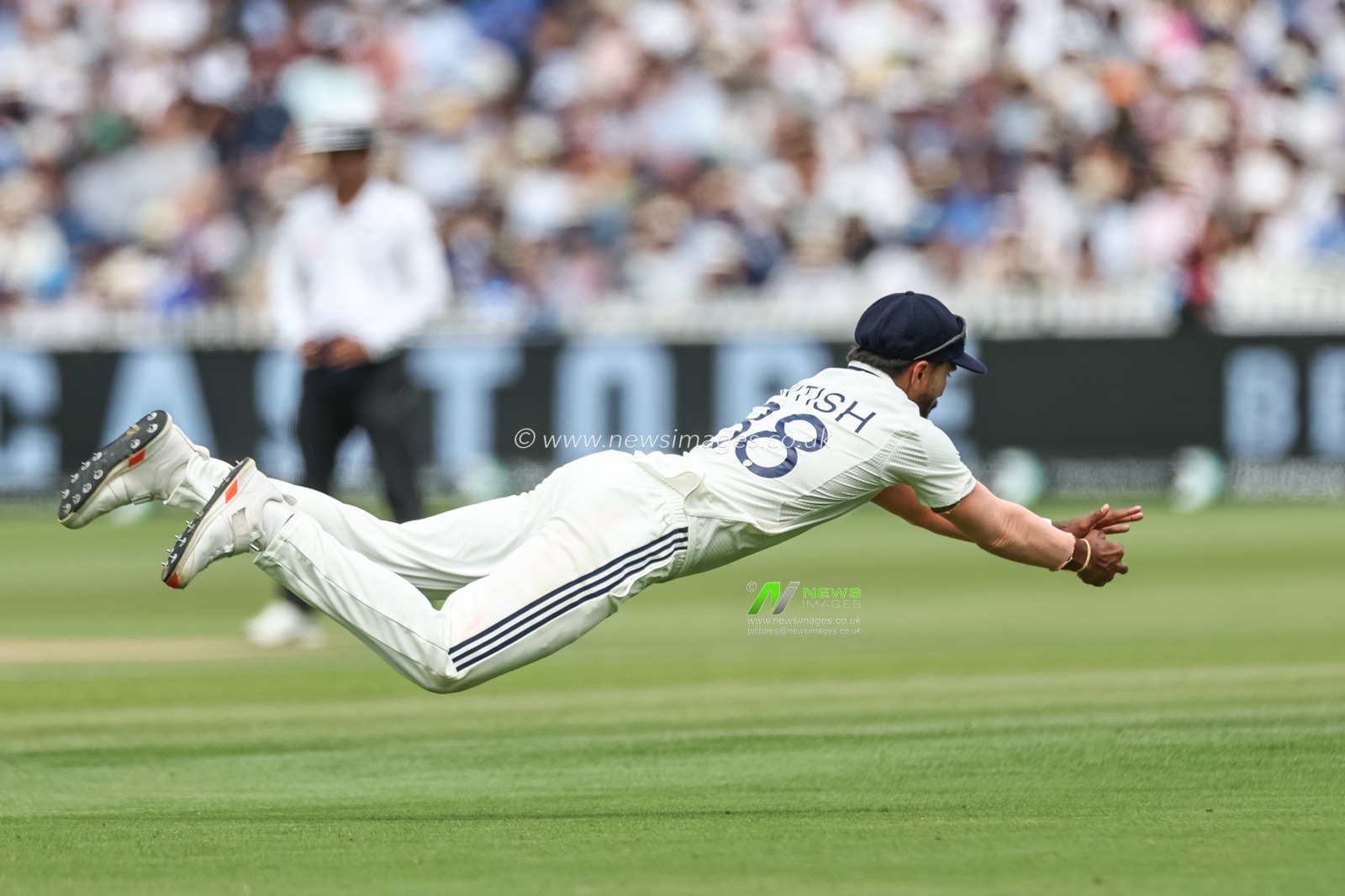 Nitish Kumar Reddy of India stops a ball from Joe Root of England during the 3rd Rothesay Test Match Day 4 England v India at Lords, London, United Kingdom, 13th July 2025

(Photo by Mark Cosgrove/News Images)