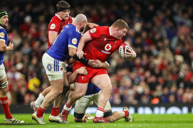 Rhys Carre of Wales is tackled by the French defense during the Guinness Six Nations match Wales vs France at Principality Stadium, Cardiff, United Kingdom, 15th February 2026

(Photo by Andrew Lewis/News Images)