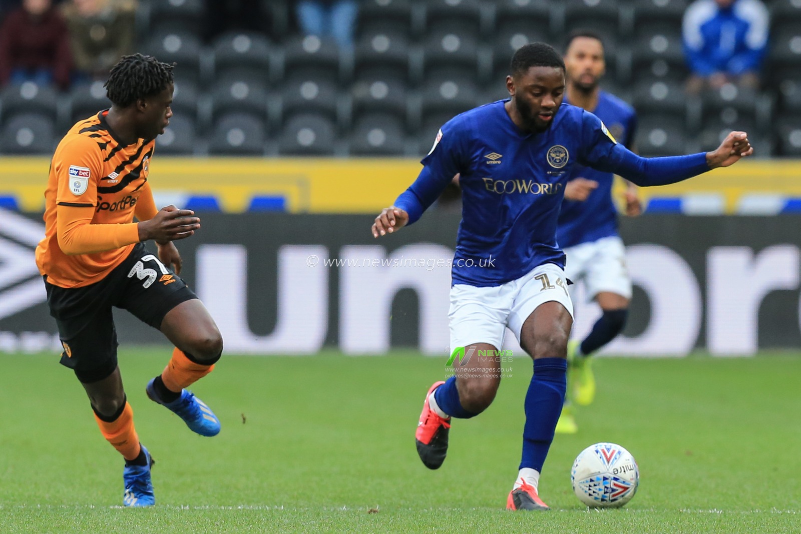 1st February 2020, KC Stadium, Kingston upon Hull, England; Sky Bet Championship, Hull City v Brentford : Josh Dasilva (14) of Brentford takes the ball away from Leonardo Da Silva Lopes (37) of Hull City