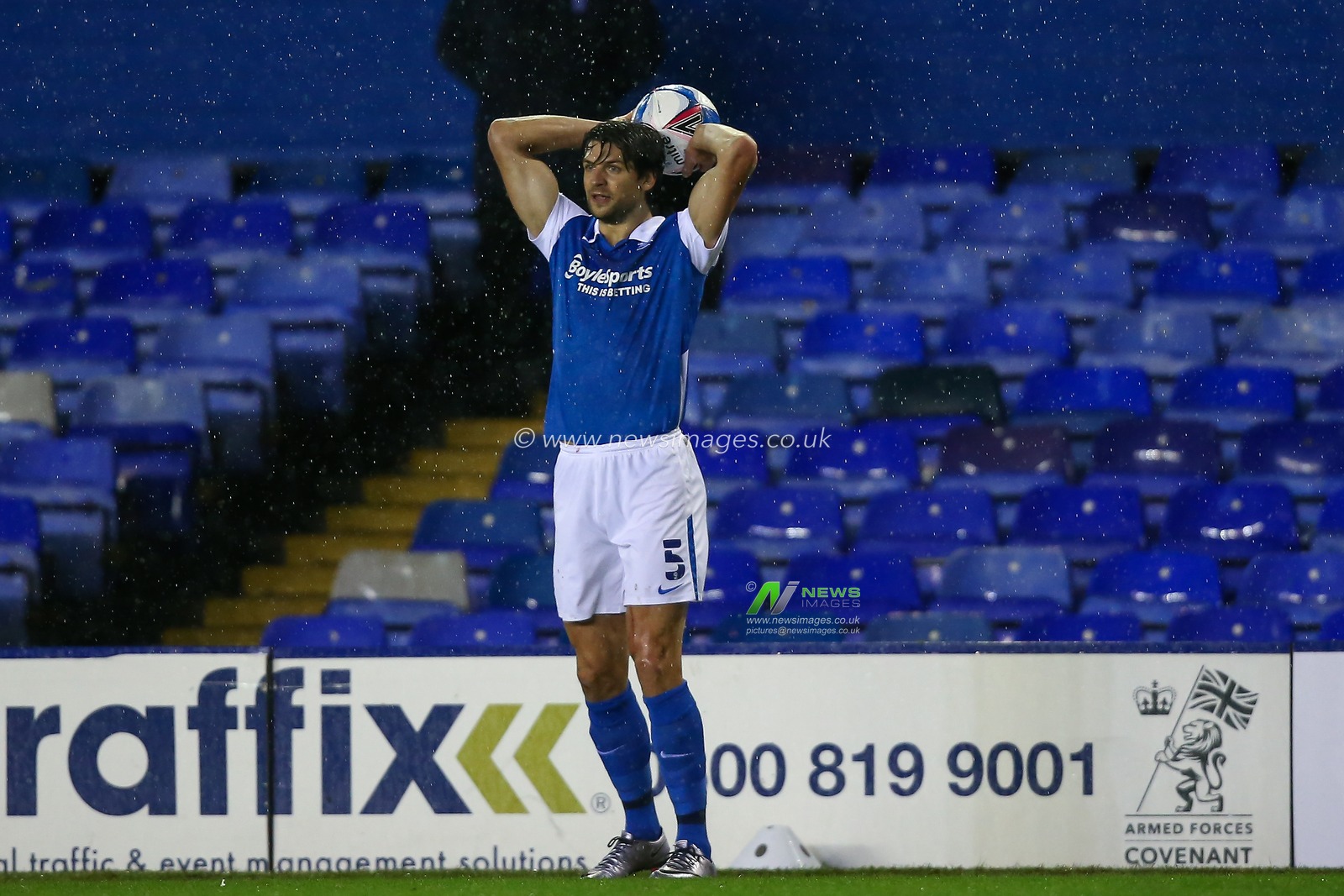 George Friend #5 of Birmingham City takes a throw in