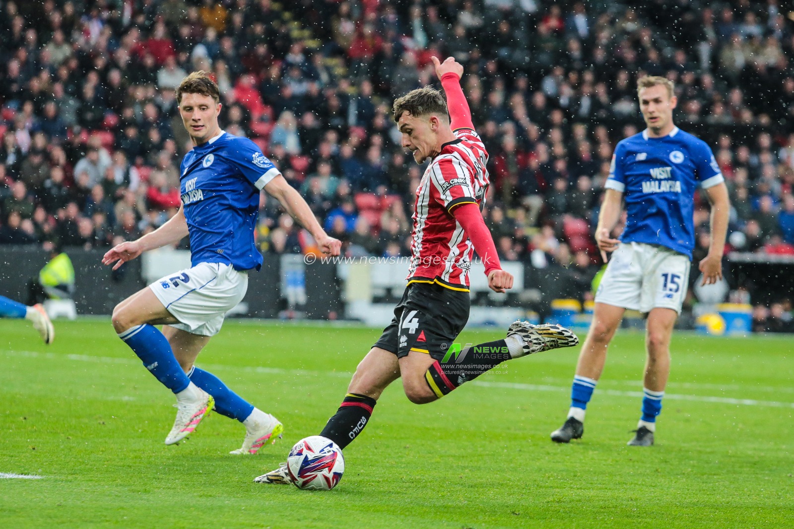 Harrison Burrows of Sheffield United shoots on goal during the Sky Bet Championship match Sheffield United vs Cardiff City at Bramall Lane, Sheffield, United Kingdom, 18th April 2025

(Photo by Richard Bierton/News Images)