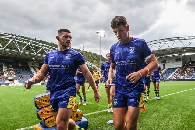 Danny Walker of Warrington Wolves and Josh Thewlis of Warrington Wolves leaves the field after warmups during the Betfred Super League Round 23 match Huddersfield Giants vs Warrington Wolves at Accu Stadium, Huddersfield, United Kingdom, 24th August 2025

(Photo by Alfie Cosgrove/News Images)