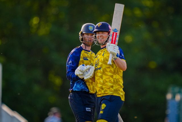 Alex Lees of Durham celebrates getting to 50 with Graham Clark of Durham by raising his bat towards the pavilion during the Vitality Blast T20 match between Derbyshire Falcons and Durham Cricket at The Central Co-Op County Ground, Derby, United Kingdom on 22 May 2026

(Photo by Maynard Manyowa/News Images)