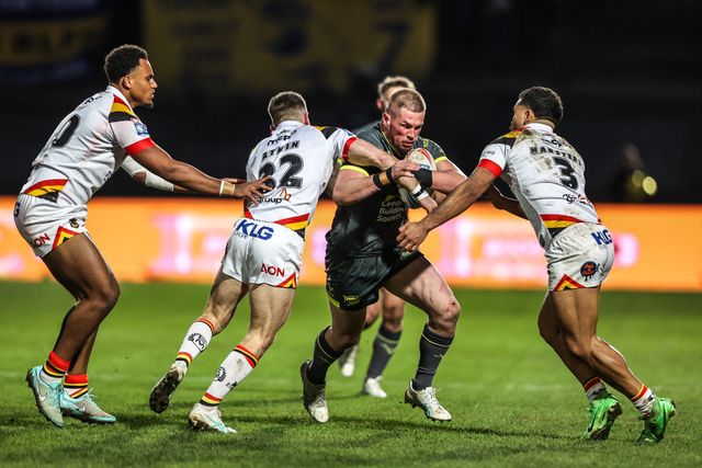 Tom Holroyd of Leeds Rhinos is tackled by Chris Atkin of Bradford Bulls and Esan Marsters of Bradford Bulls during the Betfred Super League round 7 match Bradford Bulls vs Leeds Rhinos at Odsal Stadium, Bradford, United Kingdom on 03 April 2026

(Photo by Alfie Cosgrove/News Images)