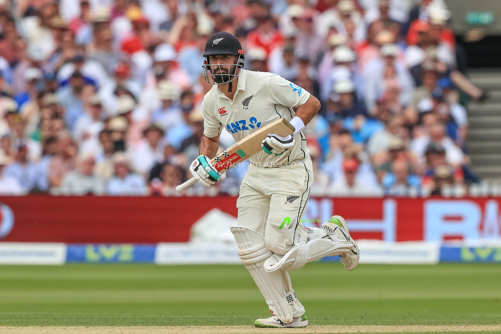 Daryl Mitchell of New Zealand makes one run