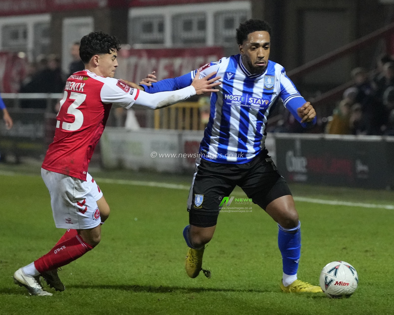 Mallik Wilks #7 of Sheffield Wednesday holds off Pheonix Patterson #23 of Fleetwood Town during the Emirates FA Cup Fourth Round Reply match Fleetwood Town vs Sheffield Wednesday at Highbury Stadium, Fleetwood, United Kingdom, 7th February 2023

(Photo by Steve Flynn/News Images)