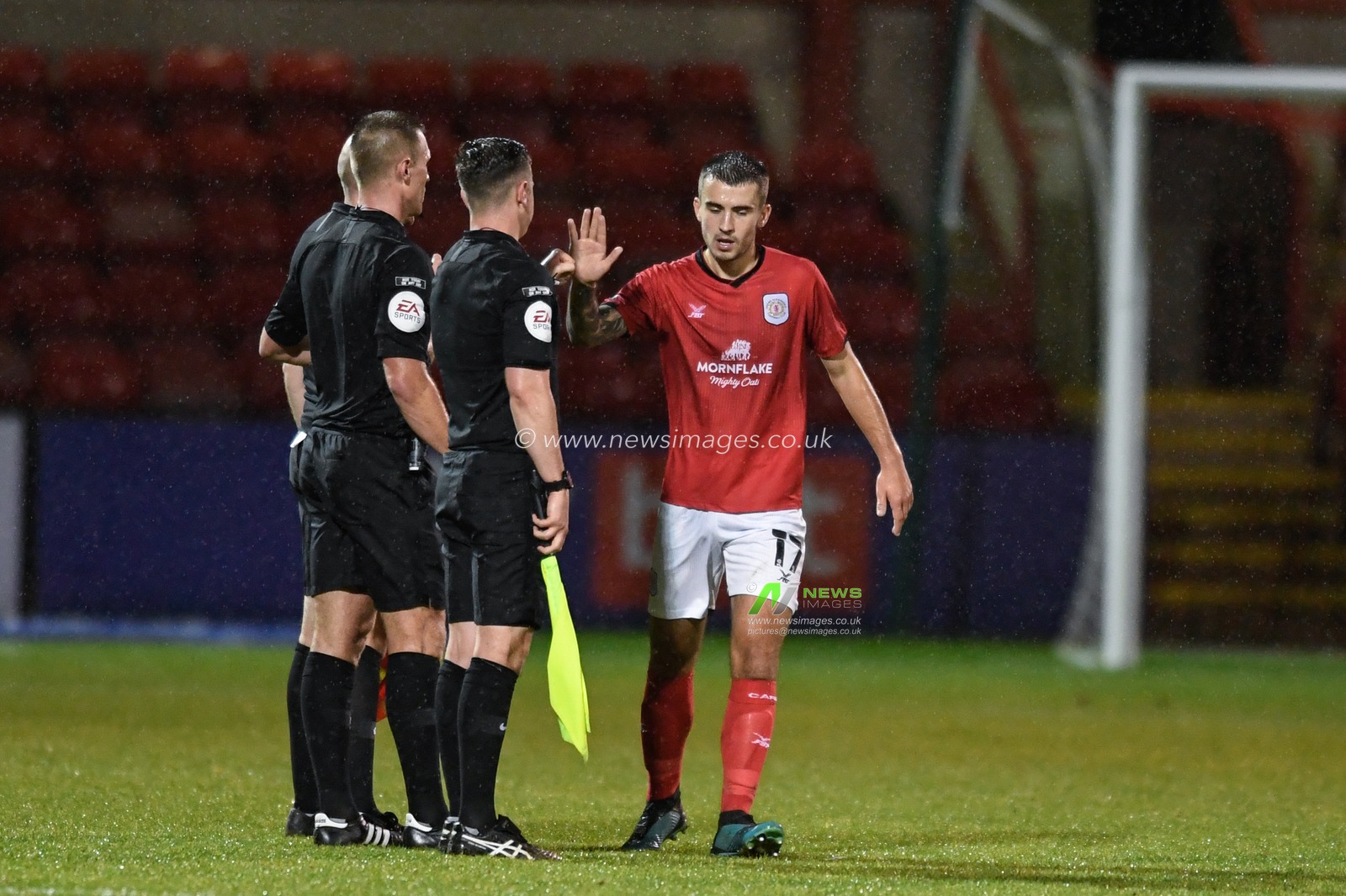 Luke Offord #17 of Crewe Alexandra high fives the referee at the end of the game