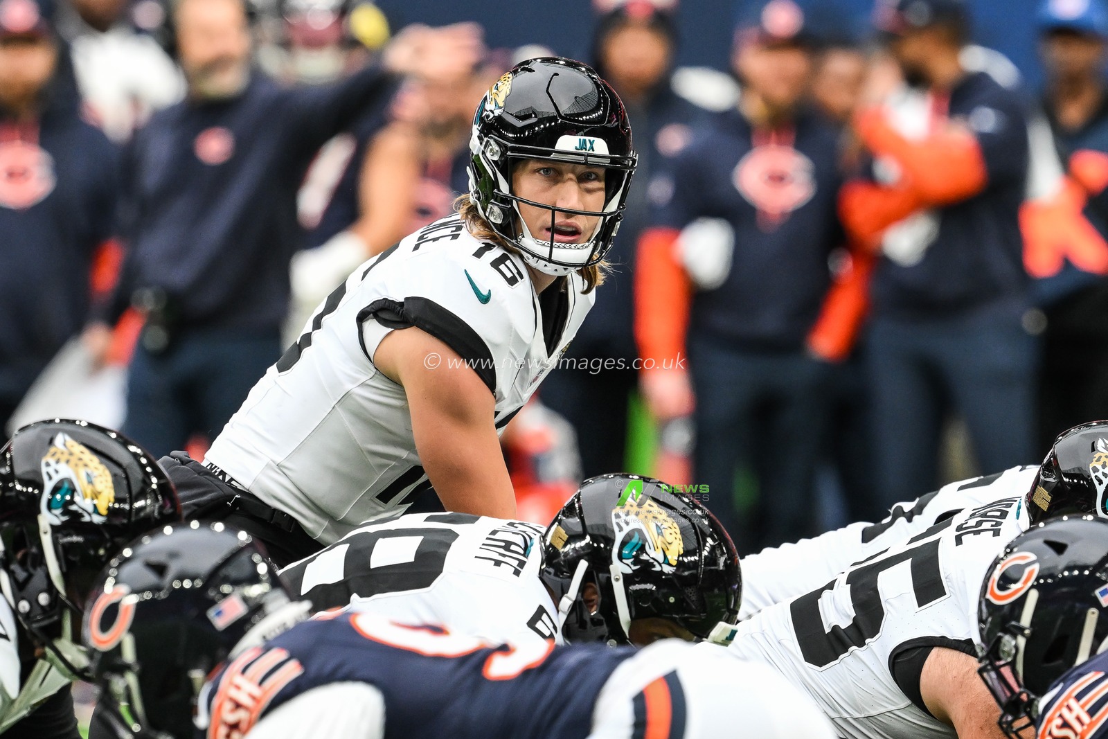 Trevor Lawrence of the Jacksonville Jaguars at the line of scrummage during the Week 6 match Chicago Bears vs Jacksonville Jaguars at Tottenham Hotspur Stadium, London, United Kingdom, 13th October 2024

(Photo by Craig Thomas/News Images)