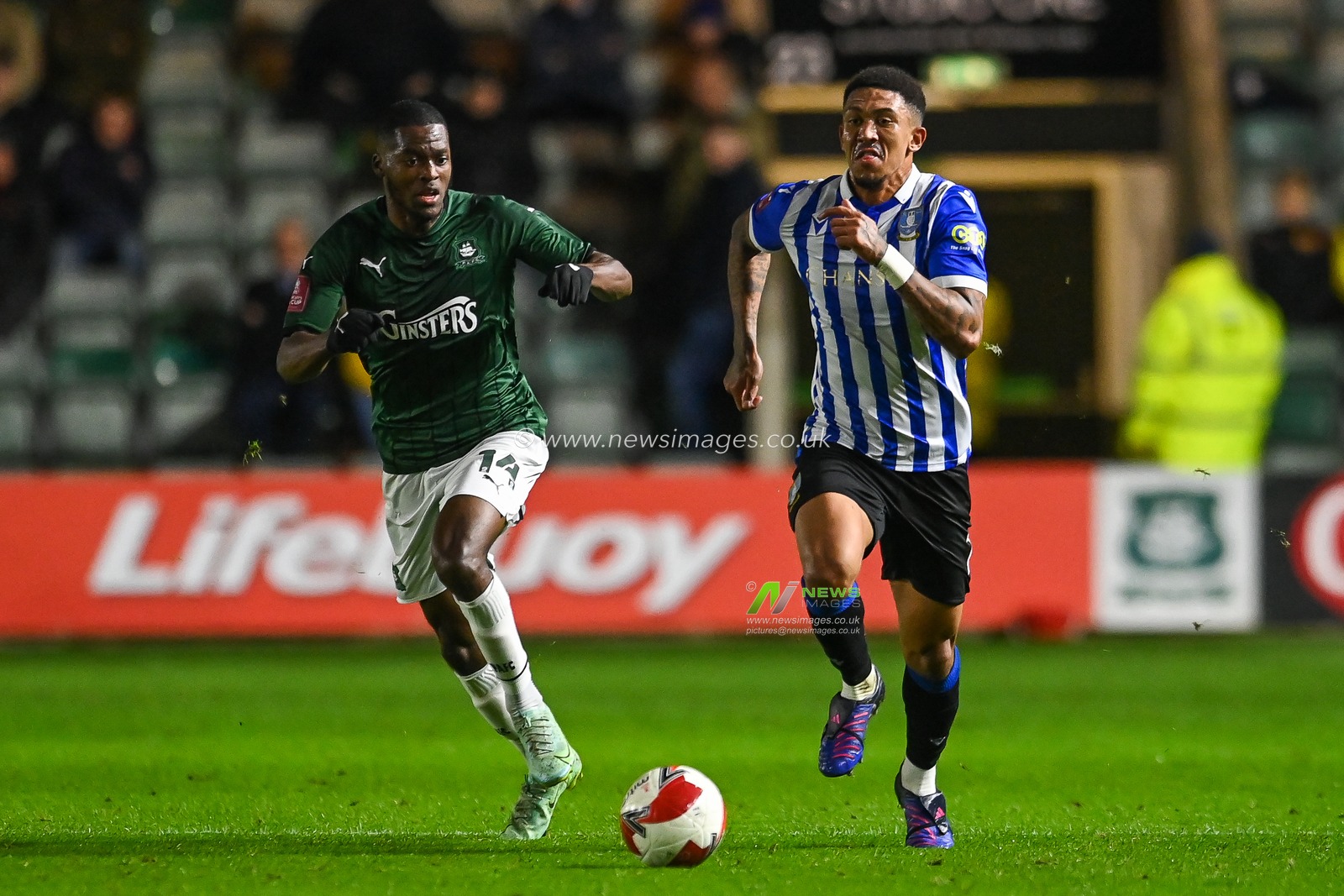 Liam Palmer #2 of Sheffield Wednesday makes a break with the ball