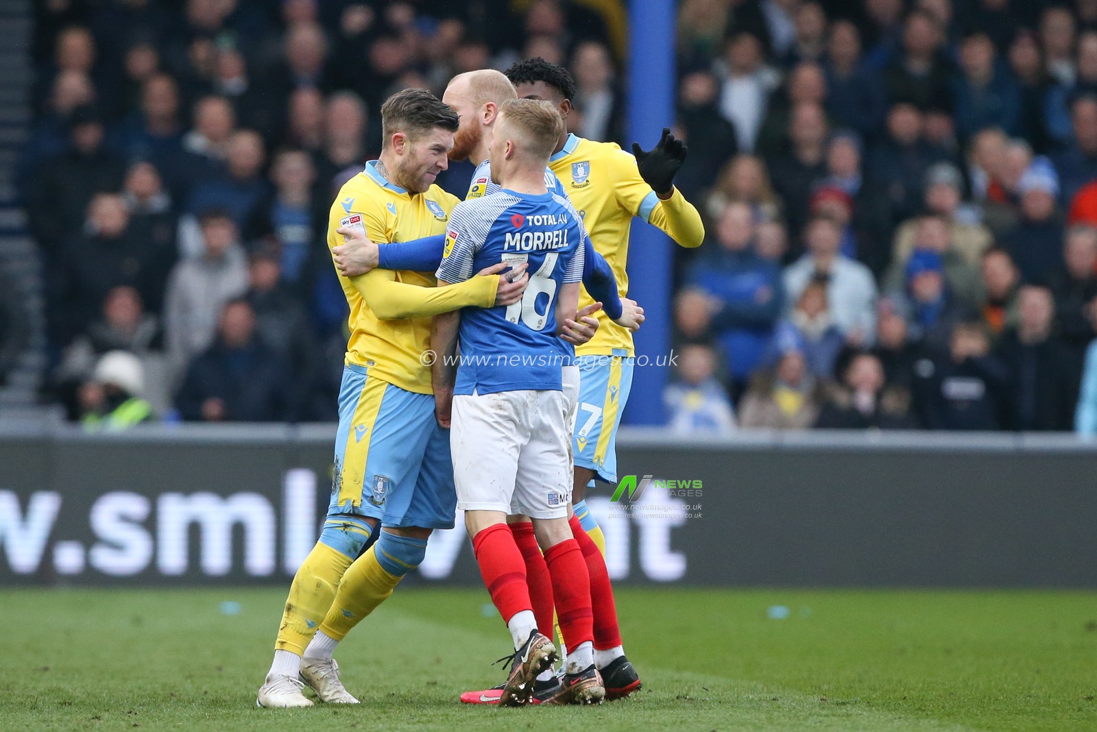 Josh Windass #11 of Sheffield Wednesday and Joe Morrell #16 of Portsmouth clash during the Sky Bet League 1 match Portsmouth vs Sheffield Wednesday at Fratton Park, Portsmouth, United Kingdom, 11th March 2023

(Photo by Arron Gent/News Images)