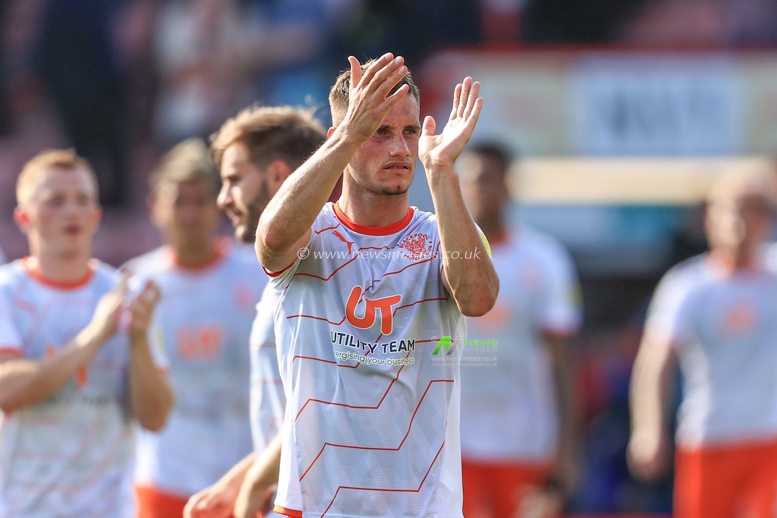 Jerry Yates #9 of Blackpool applauds the traveling fans as Blackpool take a 2-2 draw after coming back for being two goals down
