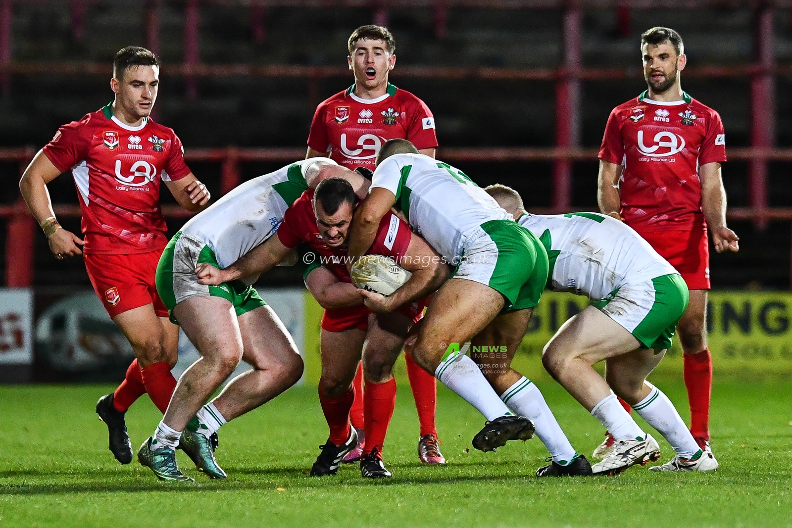 11th November 2018 , Racecourse Ground,  Wrexham, Wales ;  Rugby League World Cup Qualifier,Wales v Ireland ; Steve Parry of Wales is gang tackled by the Ireland defence


Credit:   Craig Thomas/News Images