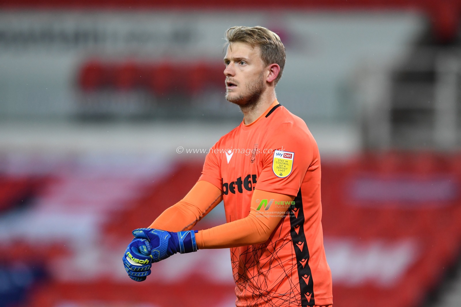 Adam Davies (16) of Stoke City in action during the game