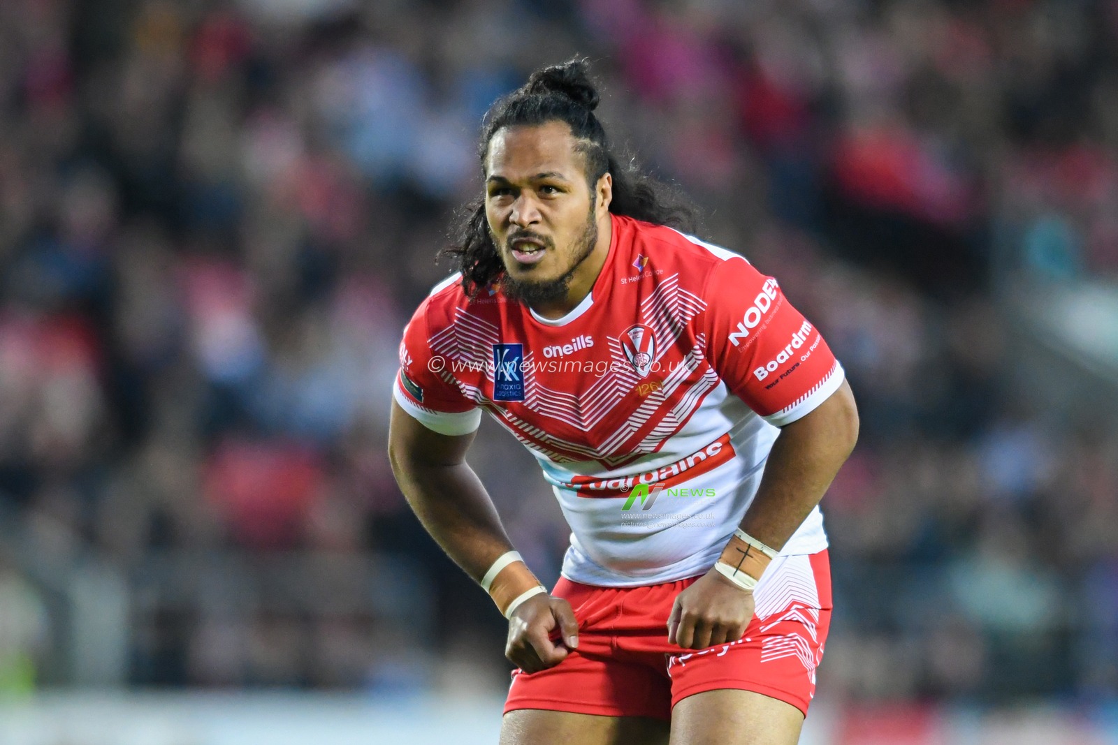 Agnatius Paasi #17 of St Helens in action during the game