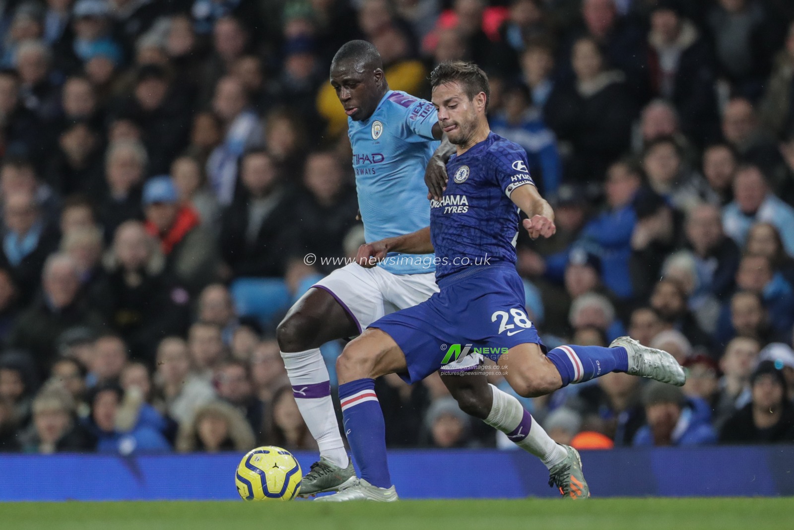 23rd November 2019, Etihad Stadium, Manchester, England; Premier League, Manchester City v Chelsea : Benjamin Mendy (22) of Manchester City and CÃ©sar Azpilicueta (28) of Chelsea dual for the ball 

Credit: Mark Cosgrove/News Images
