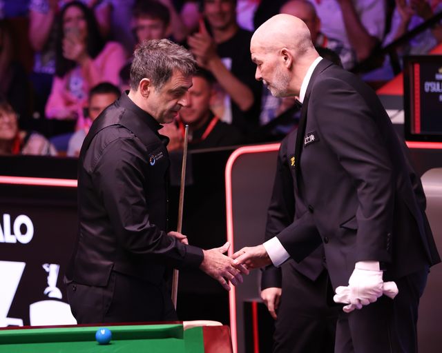Ronnie O'Sullivan of England shakes the hand of referee Jan Verhaas after the game against Pang Junxu of China on day ten of the 2025 Halo World Snooker Championship at Crucible Theatre, Sheffield, United Kingdom, 28th April 2025

(Photo by Alex Roebuck/News Images)