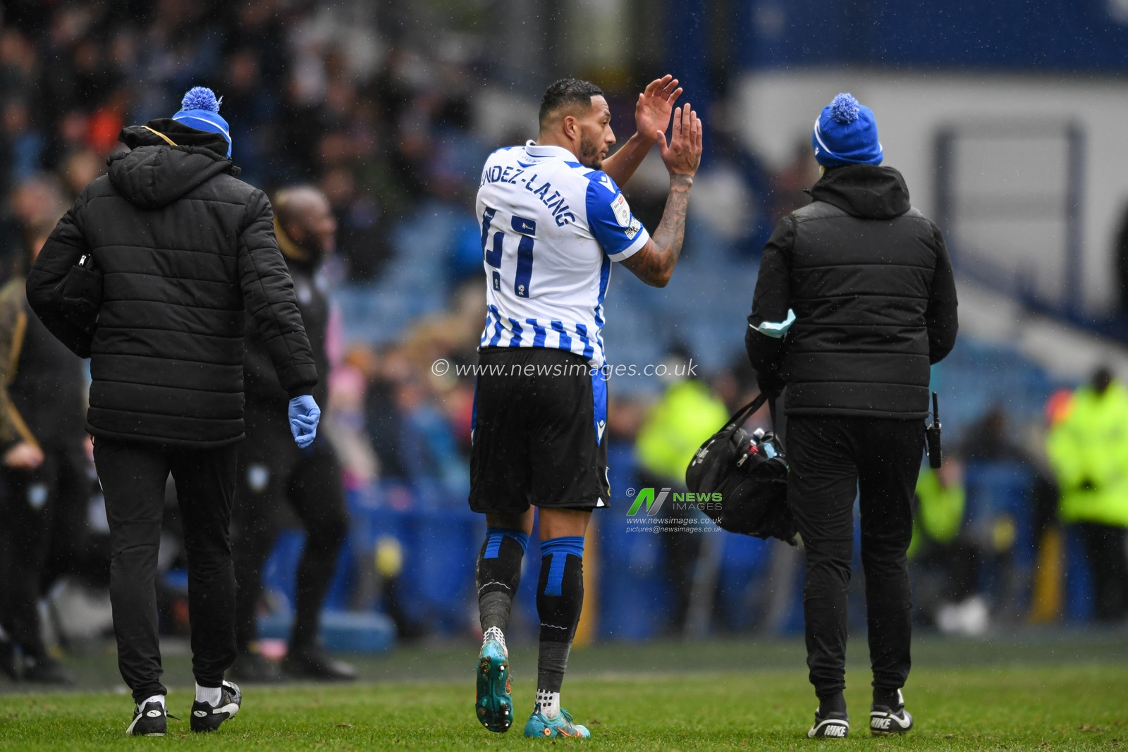 Nathaniel Mendez-Laing #41 of Sheffield Wednesday leaves the pitch after picking up an injury