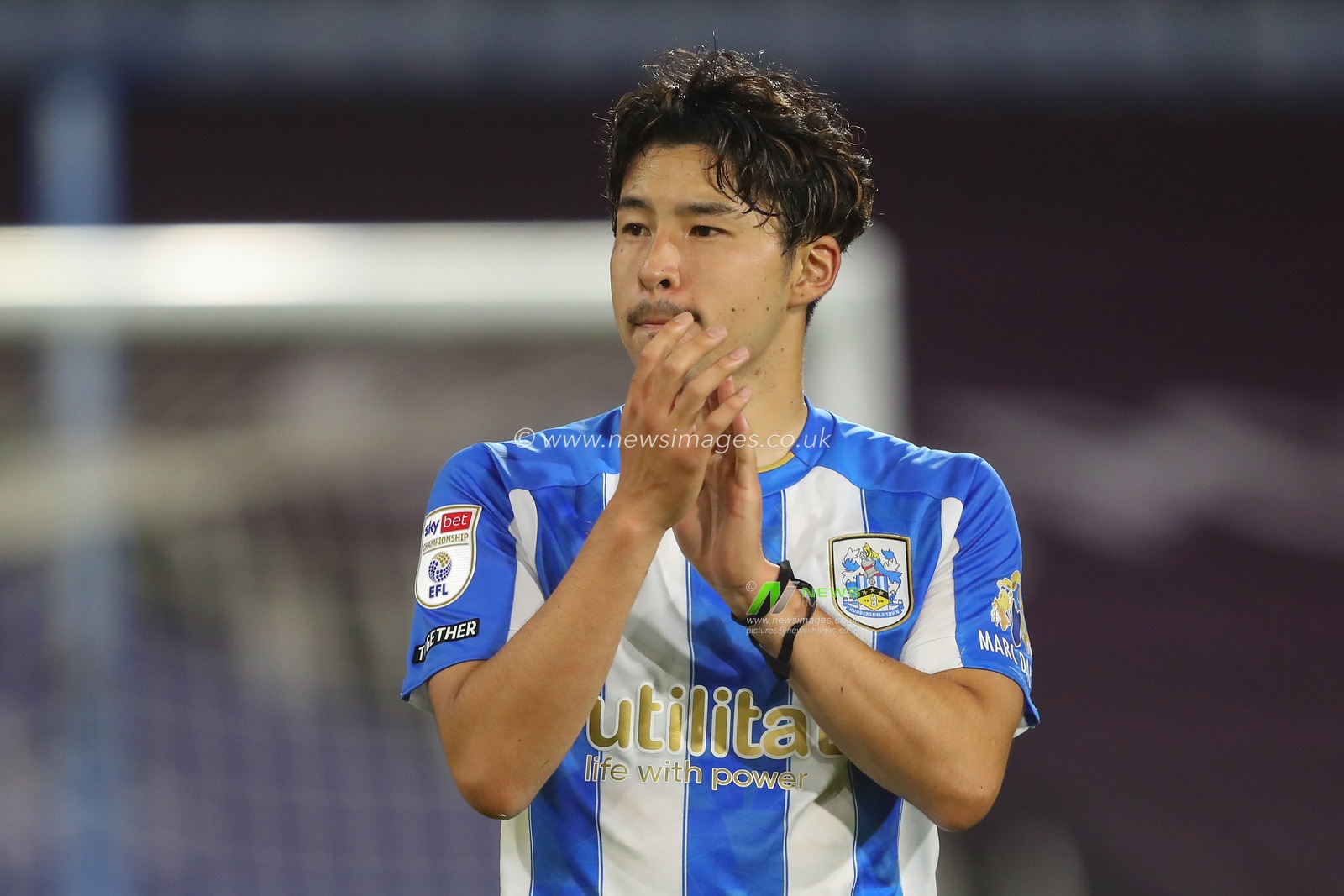 Yuta Nakayama #33 of Huddersfield Town applauds the home fans after the Sky Bet Championship match Huddersfield Town vs Stoke City at John Smith's Stadium, Huddersfield, United Kingdom, 20th September 2023

(Photo by Gareth Evans/News Images)